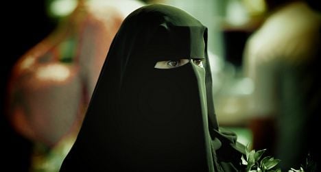 Passenger hits driver in ‘burqa ban’ bust-up