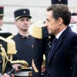 Sarkozy and Merkel demand tough new pact