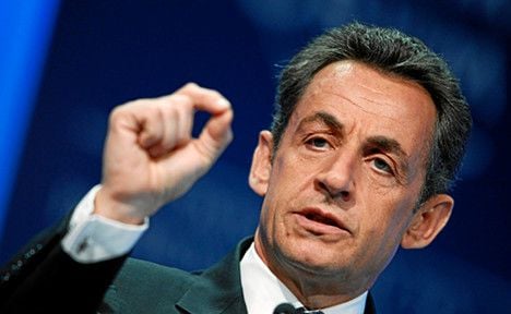 Sarkozy plays down effect of AAA loss
