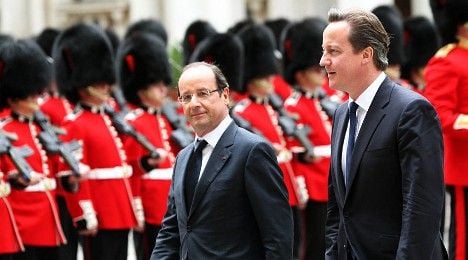 Hollande and Cameron laugh off differences