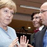 Hollande meets Merkel as Greece pleas for time