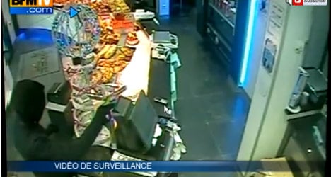 VIDEO: Broom-wielding woman fights off gunman