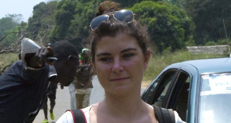 Body of slain French journalist returned home
