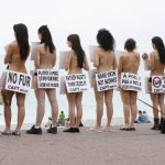 On an April day in Nice, southern France, members of the French branch of the international anti-fur group "CAFT" (The Coalition to Abolish the Fur Trade) joined the action. Here, they are demonstrating naked with boards to denounce the breeding and use of animal for fur production.Photo: AFP