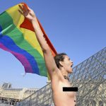 A woman from the Arab and Muslim world demonstrates naked in front of the Louvre pyramid, on March 8th, 2014, to denounce women's oppression in muslim countries on the occasion of the women's international dayPhoto: AFP