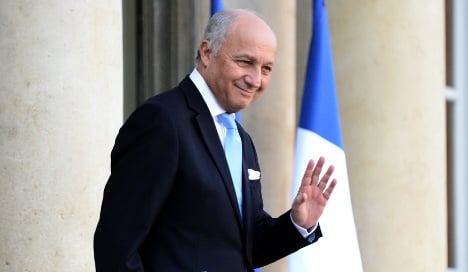 From blood scandal to climate deal: Laurent Fabius bows out