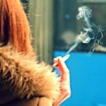 French insurer Axa to stop investing in tobacco industry
