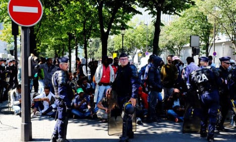 Three more migrant camps evacuated in Paris