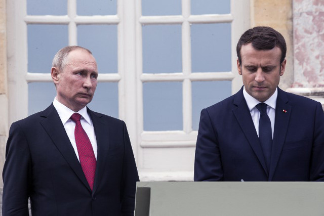 Macron slams ‘lying Russian propaganda’ in frank talks with Putin
