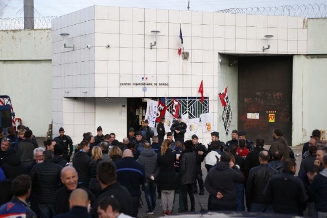 French prison unions vote to press on with strike