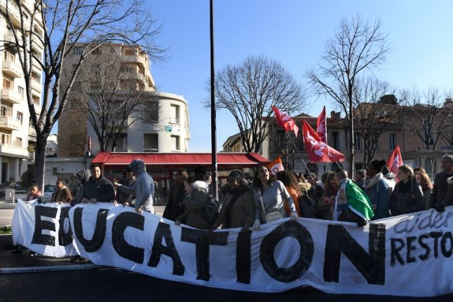 Why are teachers across France on strike?