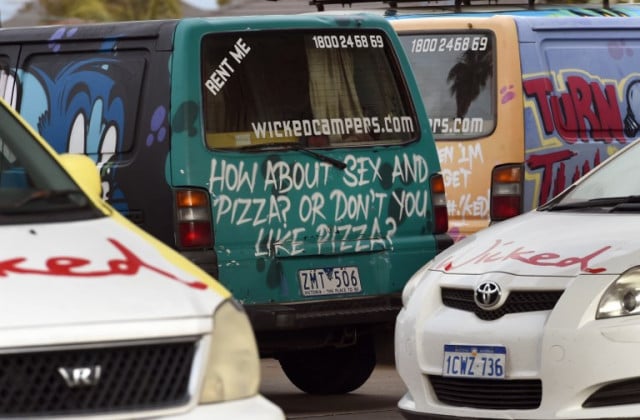 Campervans are parked in the depot of Wicked Campers, an Australian campervan firm known for the eye-catching slogans on its vehicles, in Sydney on July 14, 2014. The firm on July 14 faced outrage on social media after thousands signed an online petition against its 
