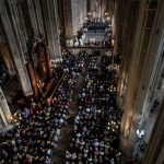 In shadow of burned Notre-Dame, Paris Catholics pray for Easter renewal