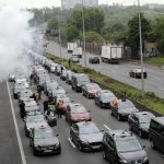 What is the protest by French taxi drivers, driving instructors and ambulance workers all about?