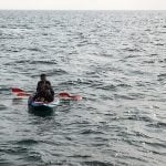 Migrant rescued swimming from France to Britain with rubber ring and flippers