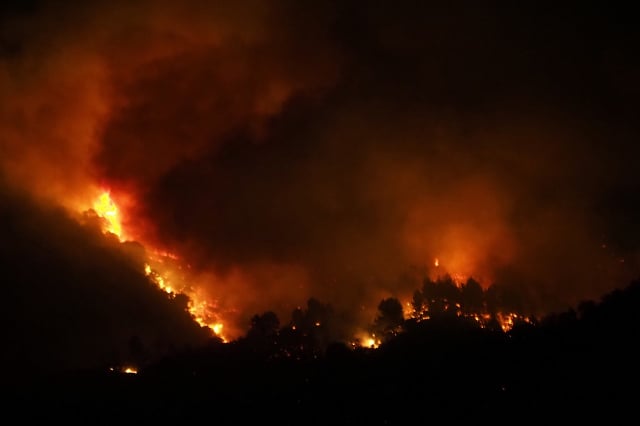 UPDATED: Strong winds fan wildfire raging in southern France