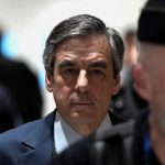 Macron seeks review of fraud case against ex-rival Fillon