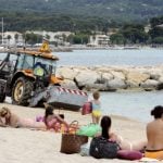 Police tell topless women on French beach to cover up