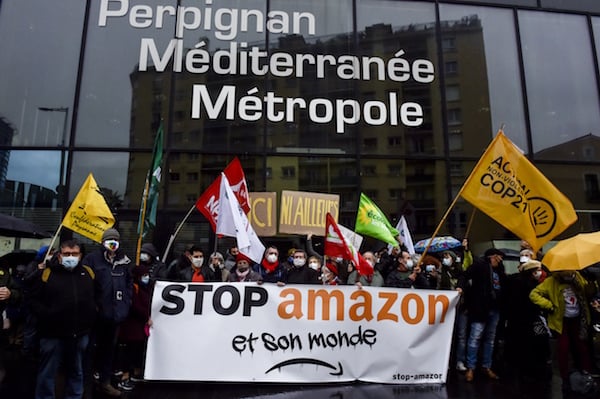 Hundreds protest Amazon expansion in France