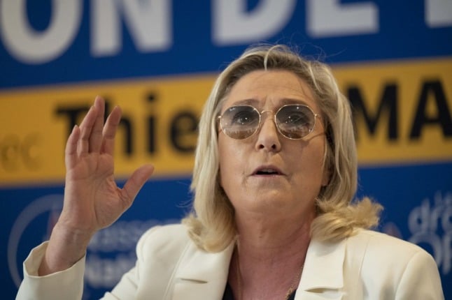 Marine Le Pen campaigns ahead of the French regional elections this weekend