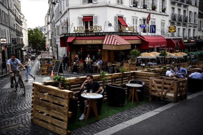 Businesses in Paris pack up expanded café terraces