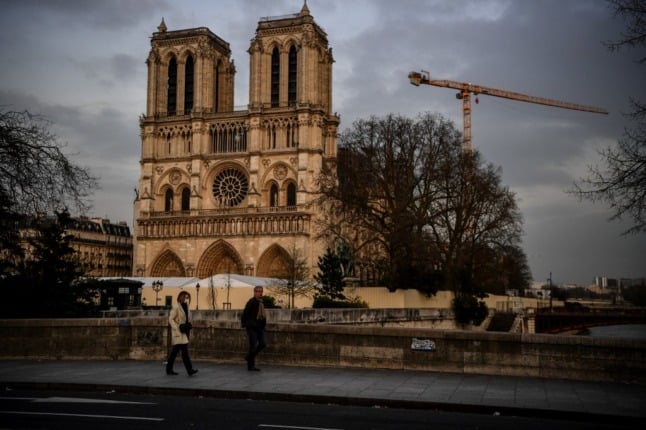 The redesigned interior of Paris' Notre-Dame cathedral will likely include banners in Mandarin and soft mood lighting. The priest in charge has defended the proposed changes.