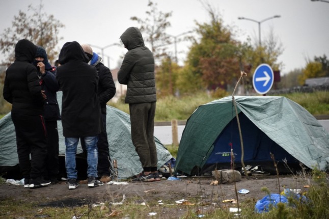 French military probe of vehicle doing 'doughnuts' in migrant camp