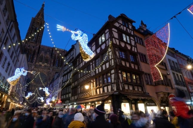 The lights are on at Strasbourg Christmas market. All markets in France now require mask wearing.
