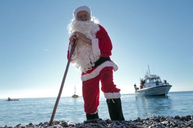 A man dressed as Santa Claus poses on the beach during the traditional Christmas swim in the French city of Nice. Here's what you need to know for the week ahead. 