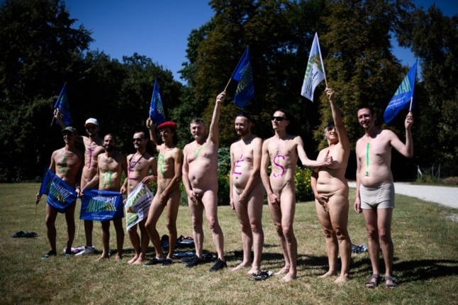 People take part in a naked bike ride in France