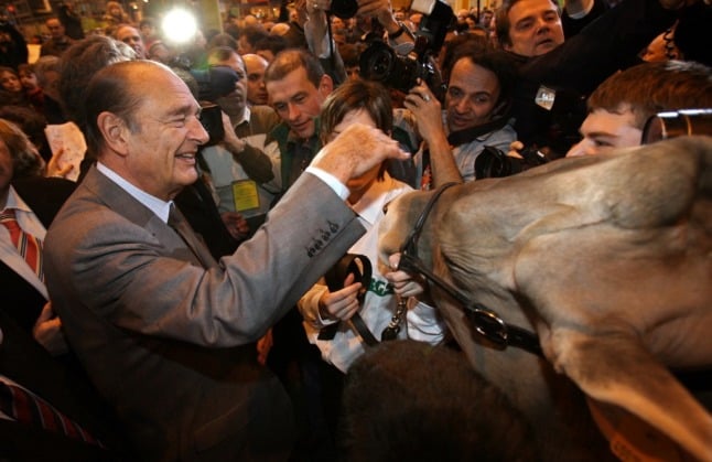 Former President Jacques Chirac inaugurates the 2007 Paris farm show.